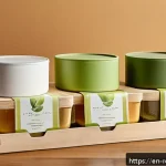 Home 18 친환경 포장재 트렌드 - A modern, eco-friendly packaging display featuring various bioplastic containers made from corn star...